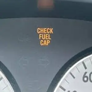 Check fuel cap warning light